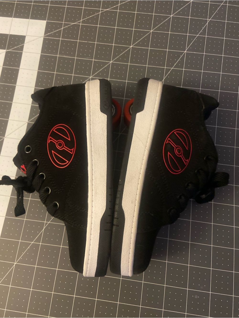 Heelys Black and White Kids' Roller Shoes with Red Logo